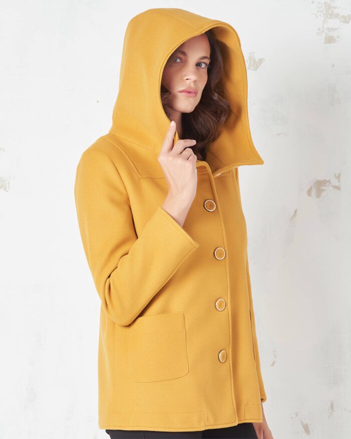Short coat with hood and visible buttons